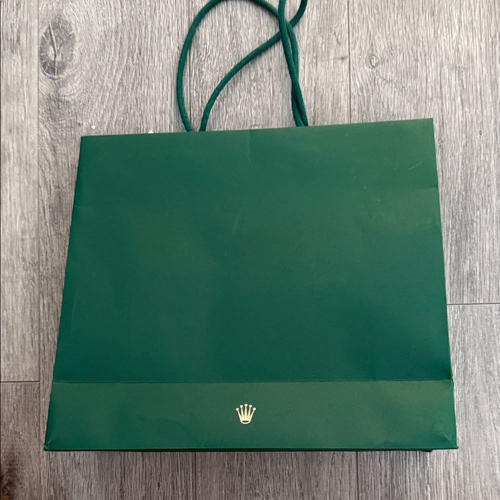 Rolex Green Bag with Gold Emblem